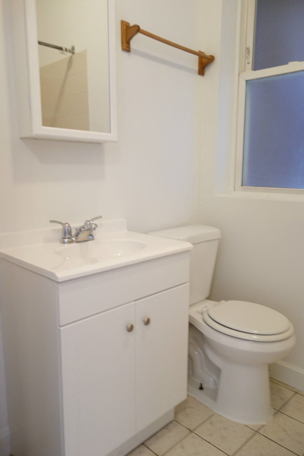 a small bathroom with a toilet and a sink