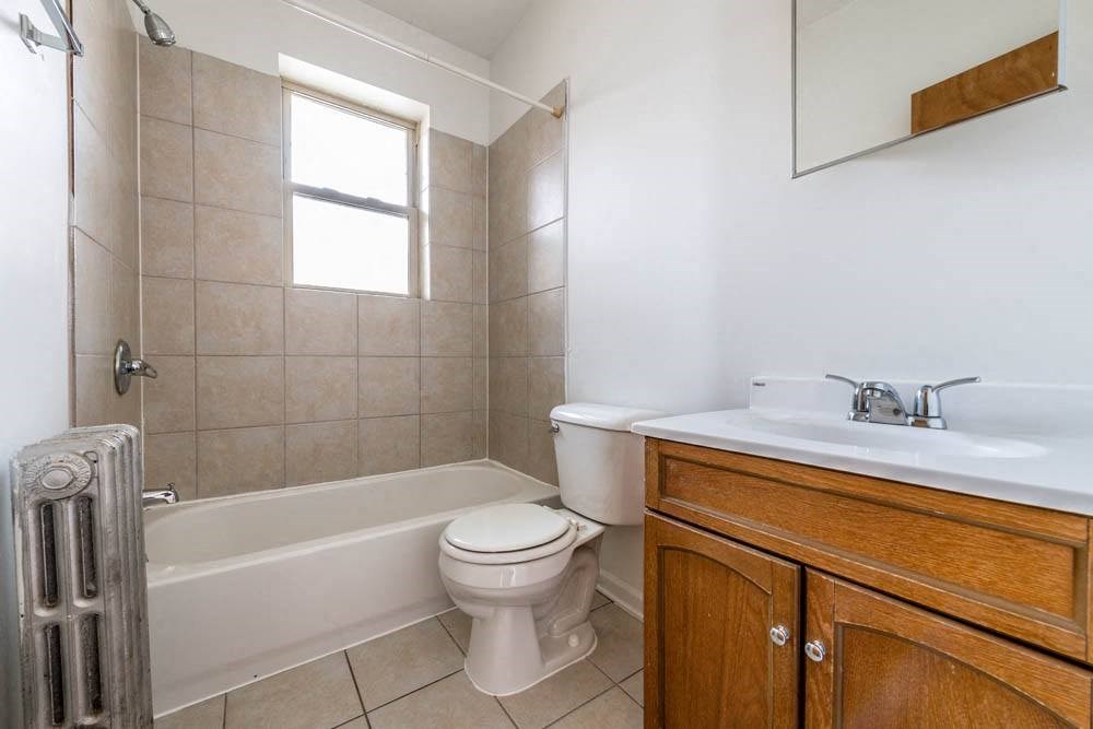 a bathroom with a toilet and a sink