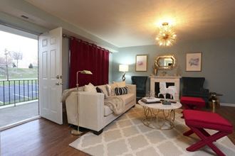 a living room with a couch and a fire place