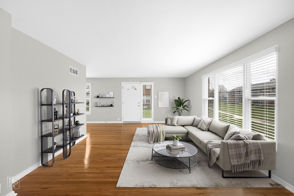 a living room with a couch and a coffee table