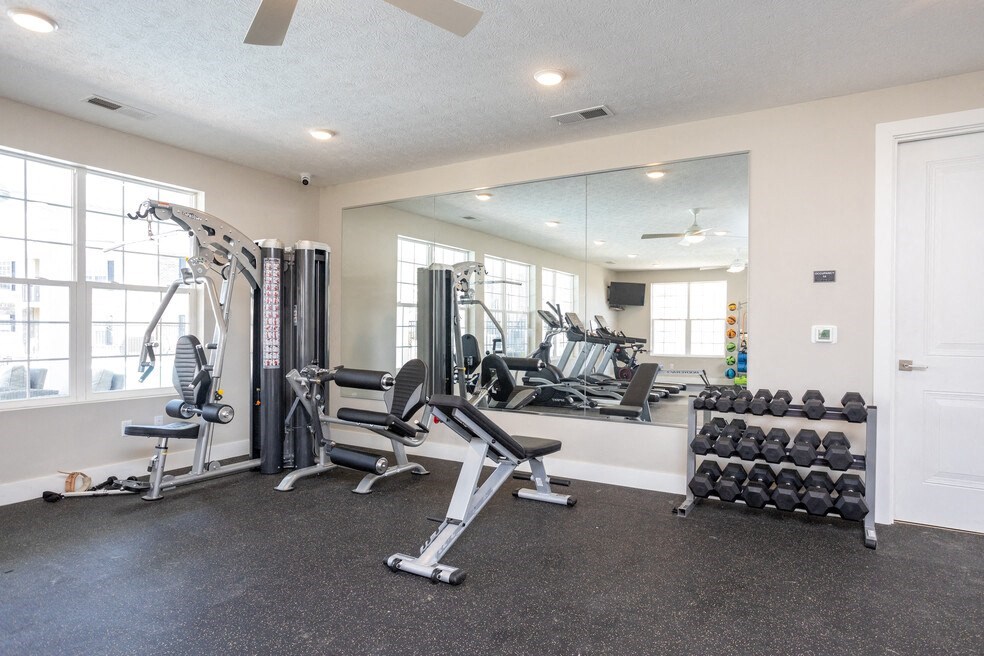 the preserve at ballantyne commons fitness room with weights and mirrors