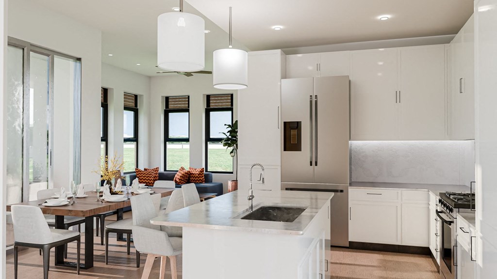 a large white kitchen with a dining area and a table at Imperial Crossing Luxury Apartment Homes, Bonita Springs
