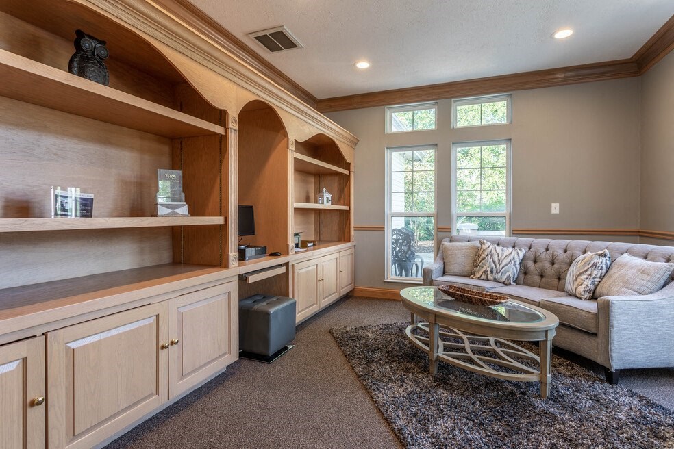 a living room with a couch and a table