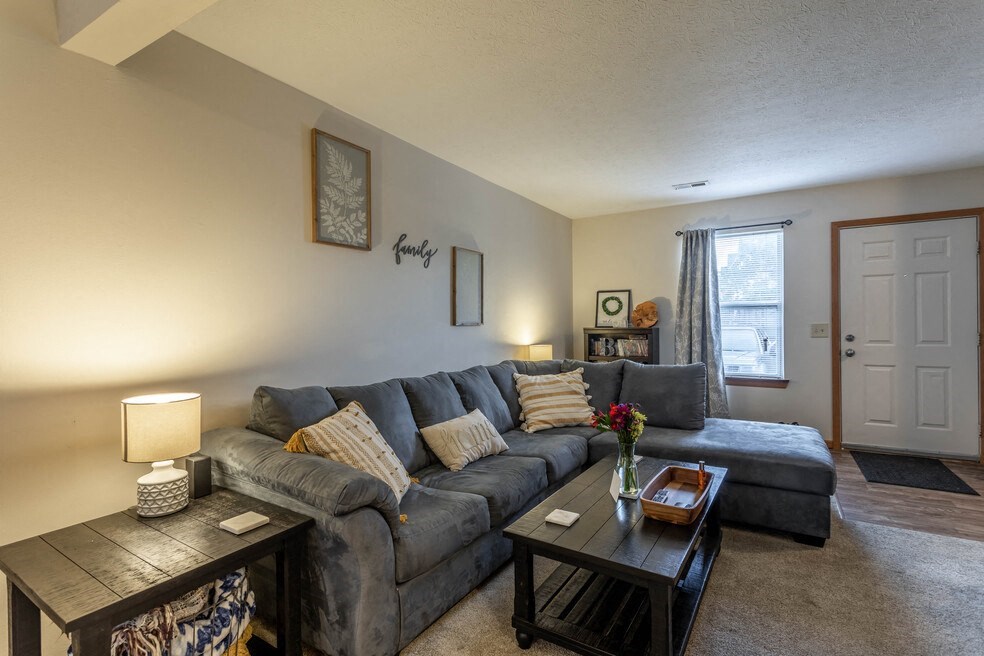 a living room with a couch and a coffee table