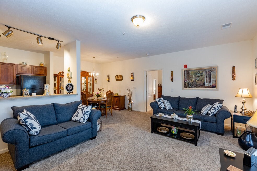a living room with couches and a coffee table