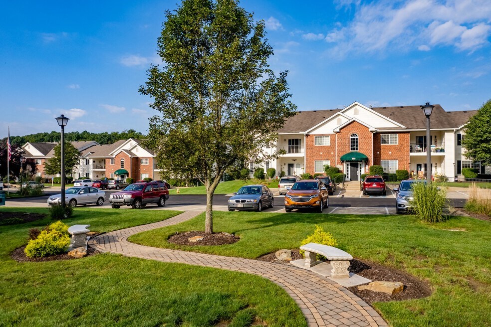 the preserve at ballantyne commons townhomes with cars parked in front