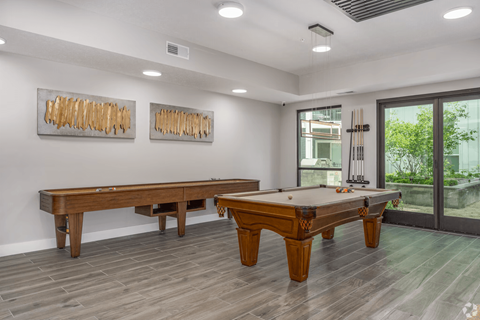 Amenities at Tiffany Flats include a clubhouse area with games.