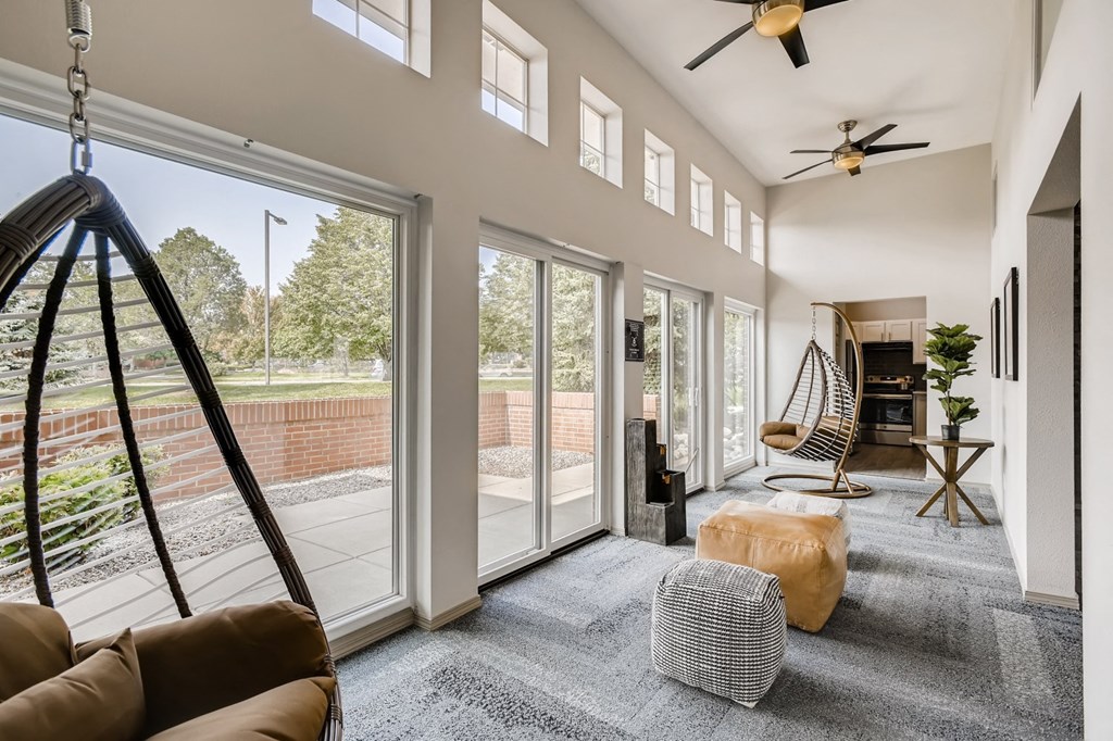 an open living room with sliding glass doors to a patio