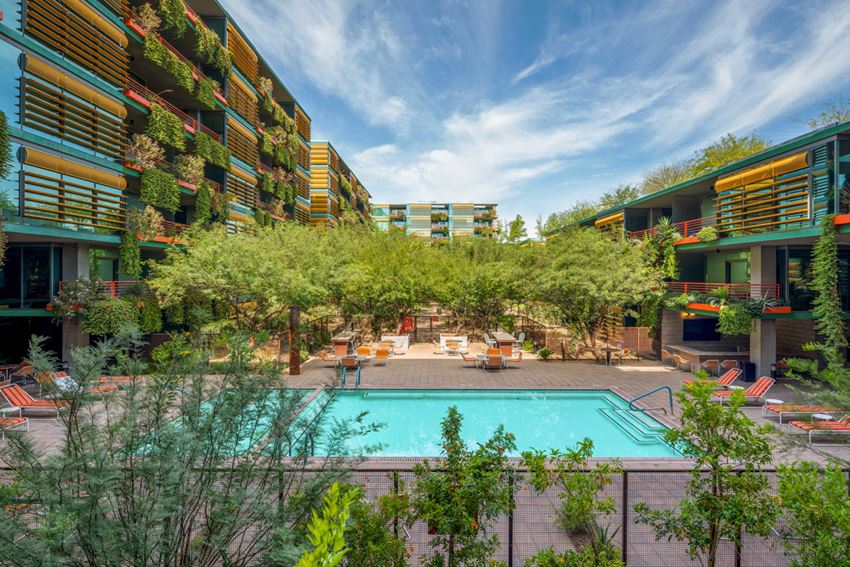 Enjoy luxurious pool days at our luxury apartment complex in Old Town Scottsdale, AZ - Photo Gallery 1