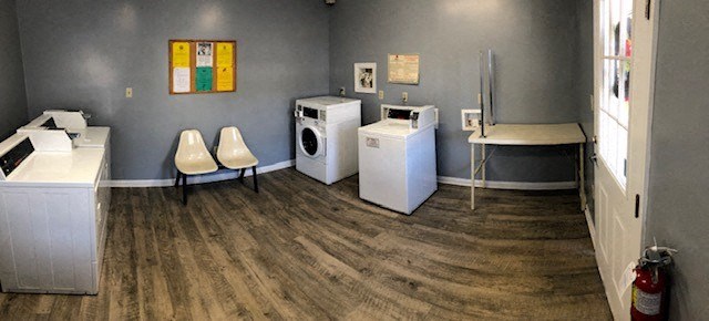 a laundry room with a washing machine and a dryer