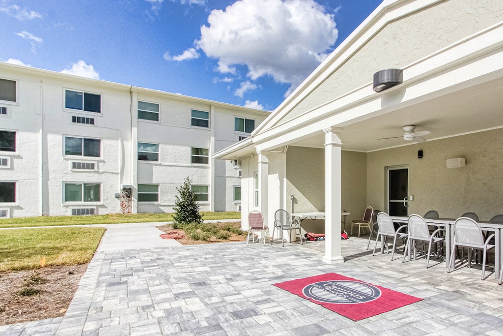 Covered patio with with seating and ceiling fans