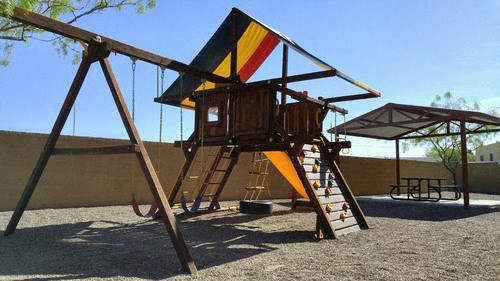a swing set in a playground