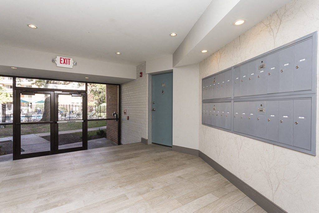 the lockers in the hallway of a building with doors