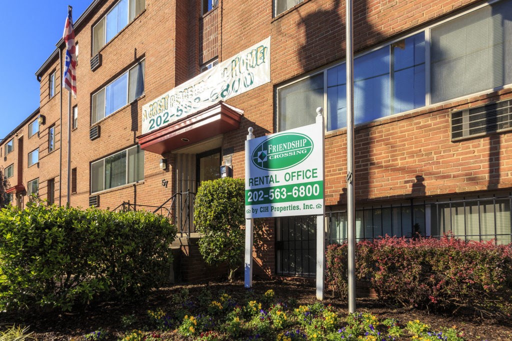 a building with a sign in front of it
