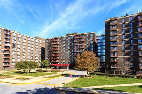 a view of a building with a street in front of it