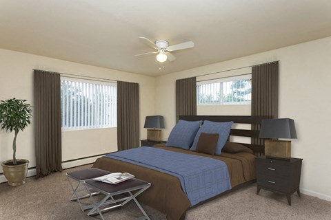 a bedroom with a bed and a ceiling fan