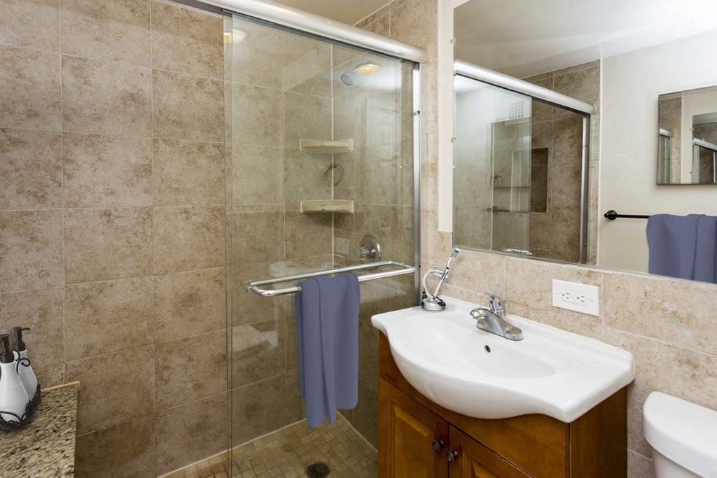 a bathroom with a sink and a shower