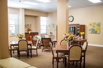 rec room 3 Episcopal Catholic Apartments in Winter Park, FL rec room with seating