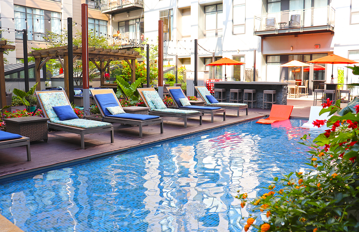 Pool With Sundecks at The Laurel Apartments, Saint Louis, MO