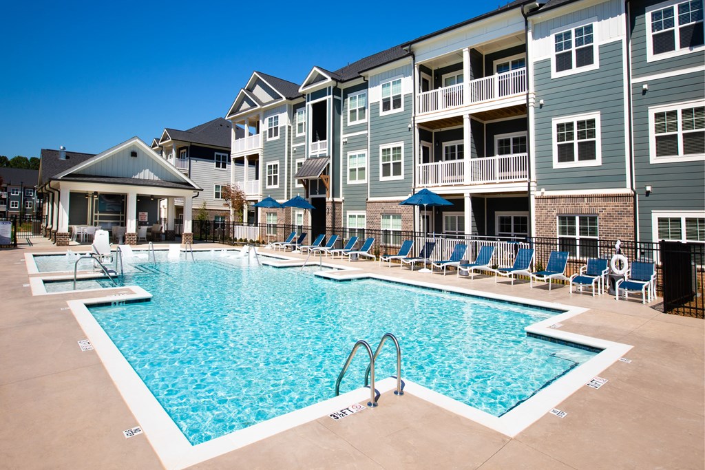 our apartments have a large pool with lounge chairs