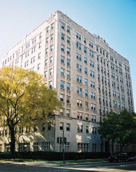 a tall building with a street in front of it
