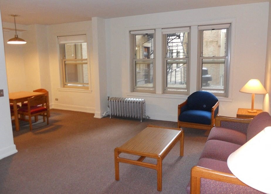a living room with a couch and a table
