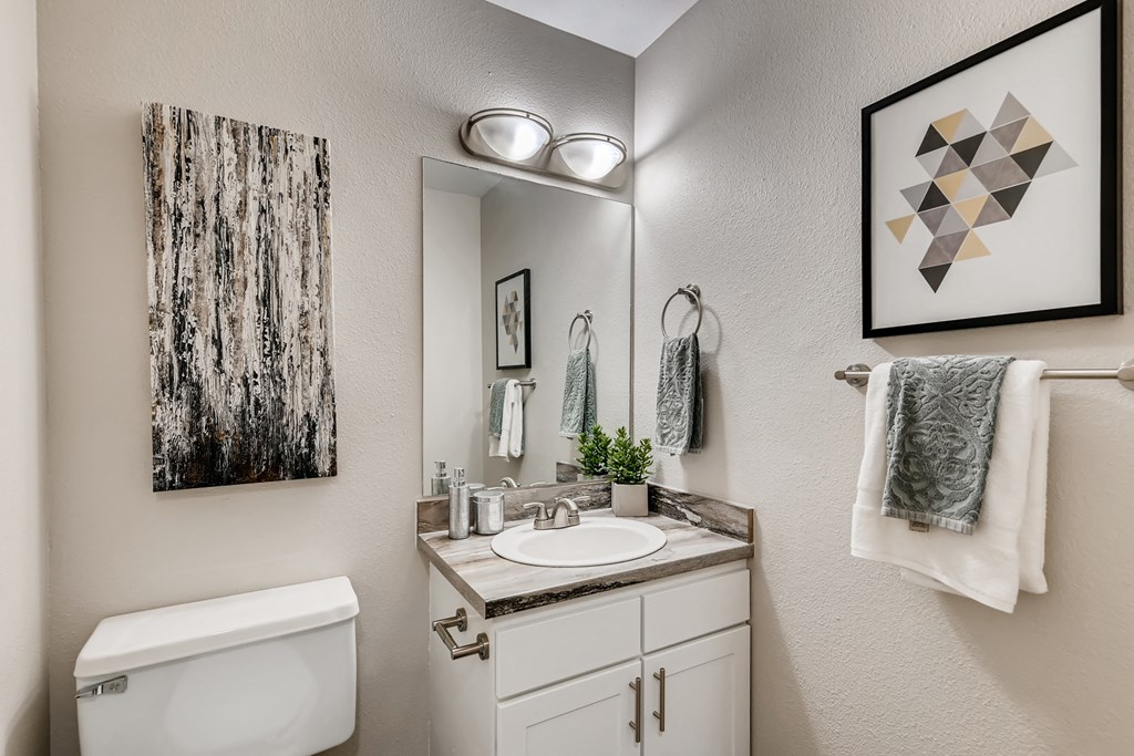 our apartments offer a bathroom with a toilet and a sink