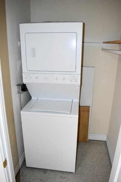a washer and dryer in a small room