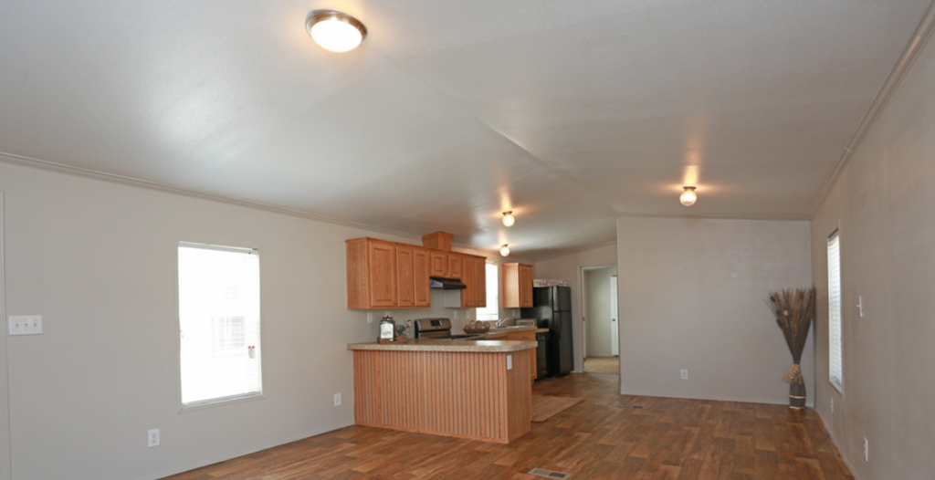 a kitchen and living room in a 555 waverly unit