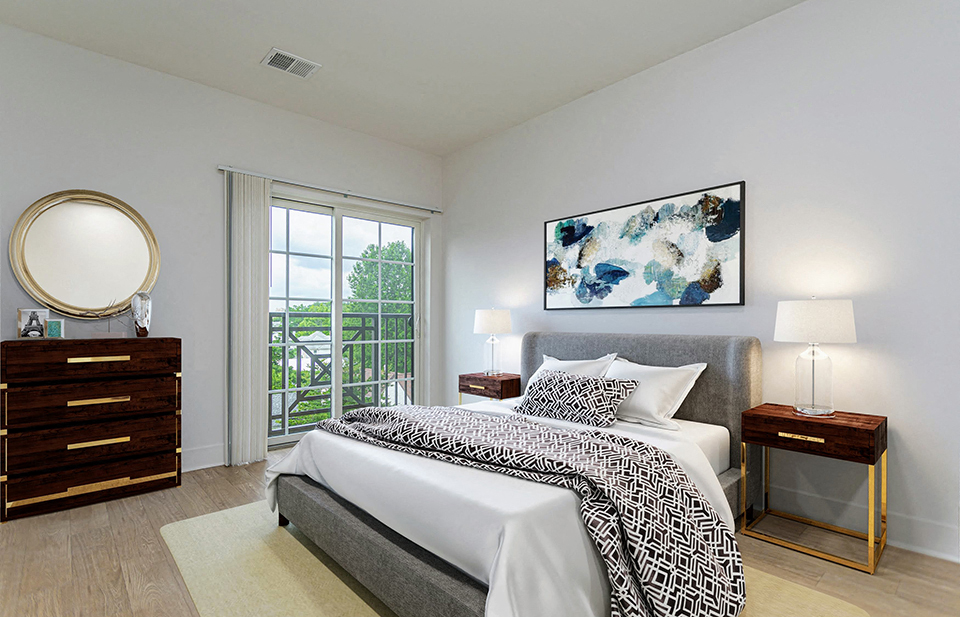 Spacious bedroom with luxury furnishings and a private balcony