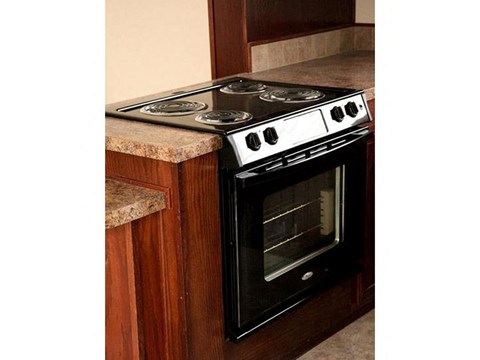 a stove with an oven in a kitchen