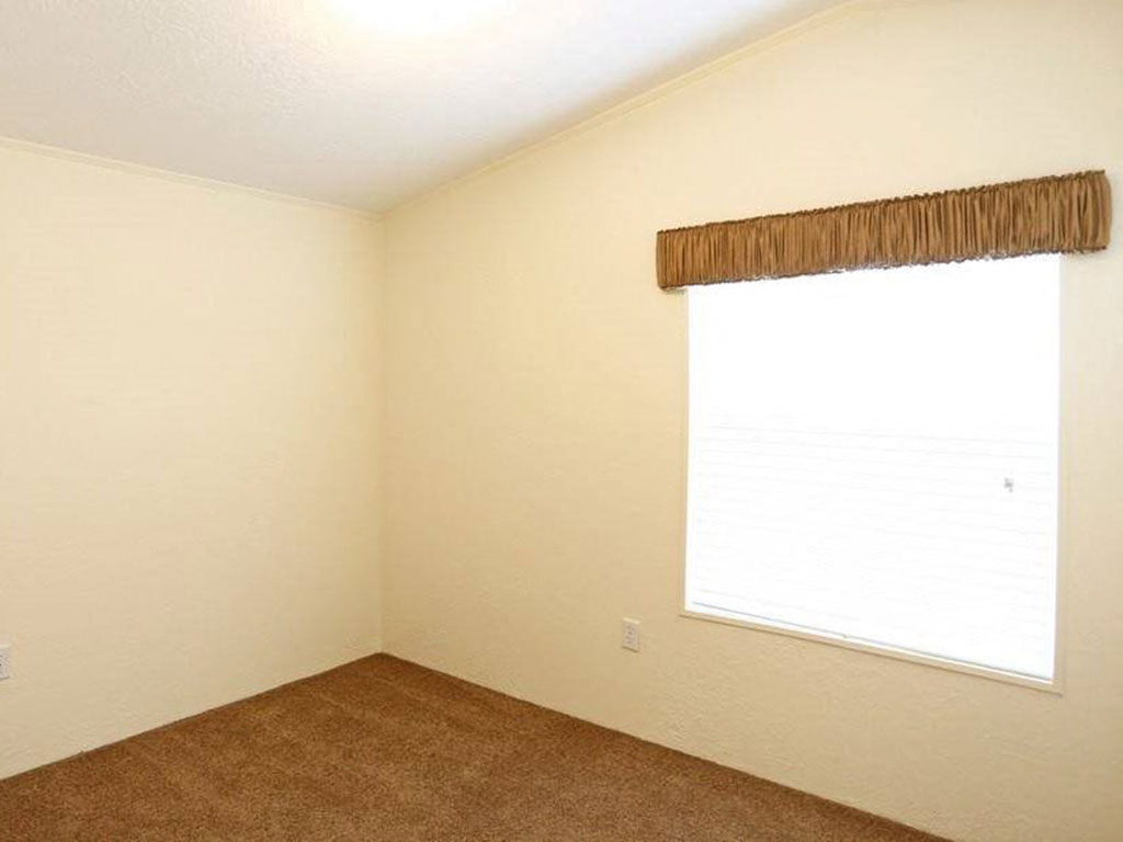 Bedroom With Window at Heritage Oaks Rental Homes in Lincoln, NE