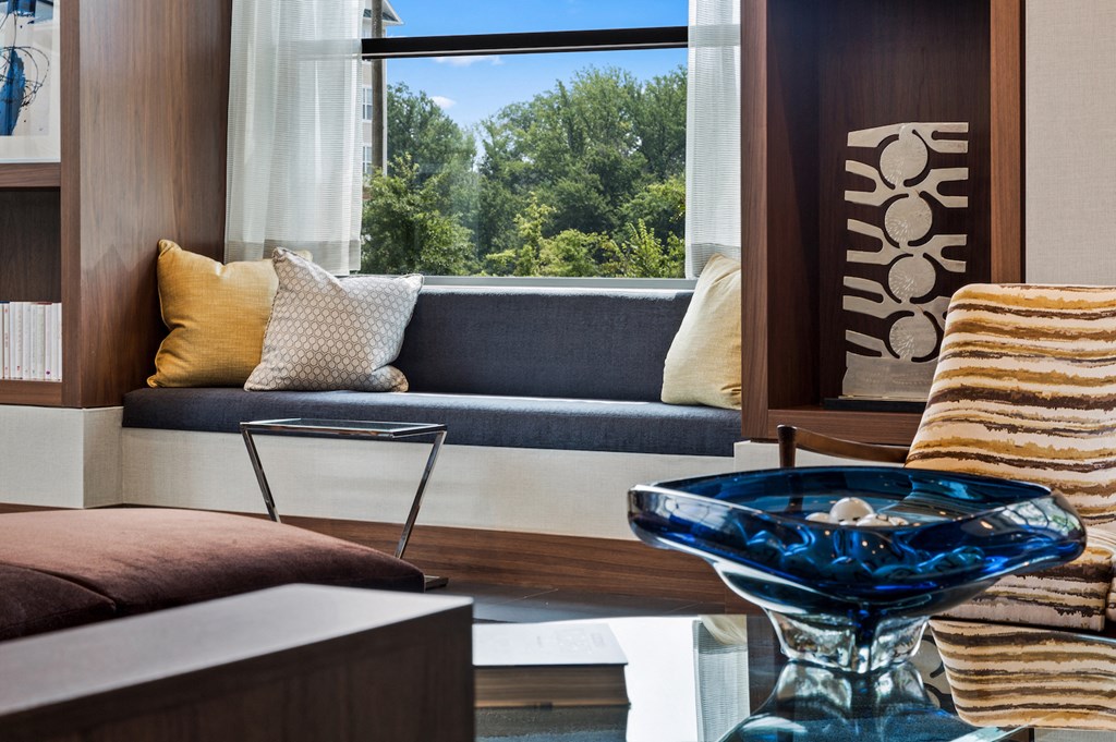 a living room with a couch and a window