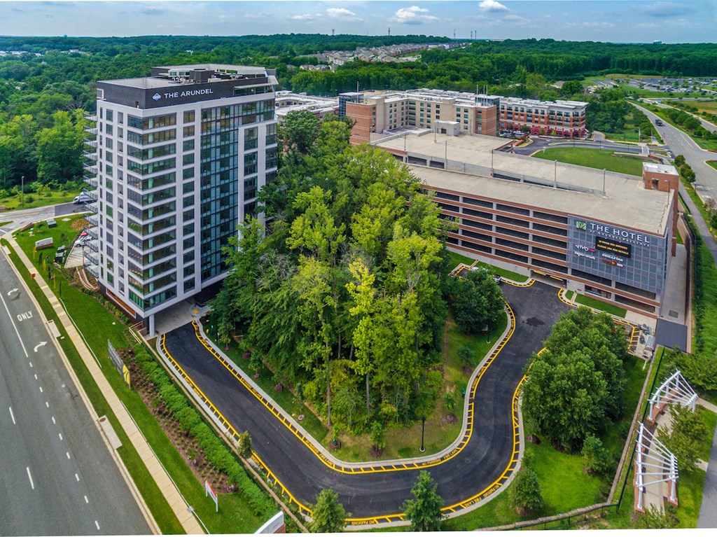 an aerial view of a city with buildings and trees