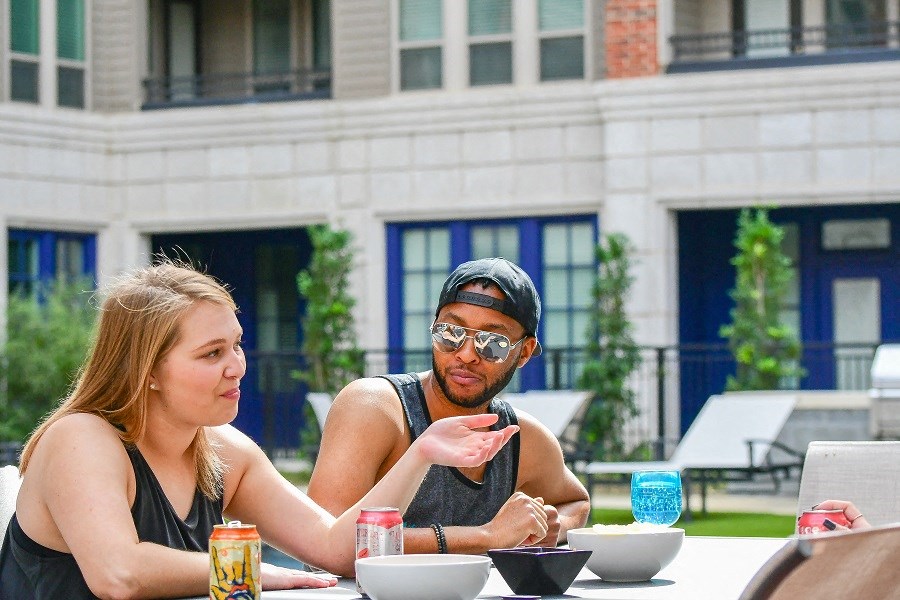 a man and a woman sitting at a table