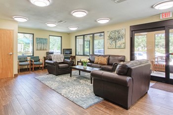 VSC-Lobby1 lobby with large windows, ample comfortable seating, and overhead lighting - Photo Gallery 5