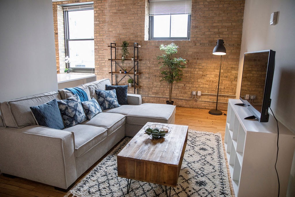 a living room with a couch and a coffee table