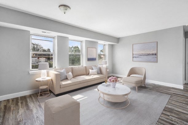 a living room with a couch and a table