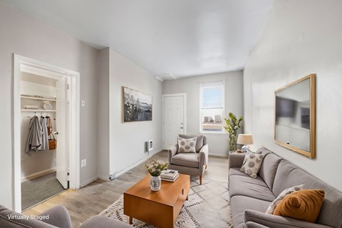 a living room with a couch and a coffee table