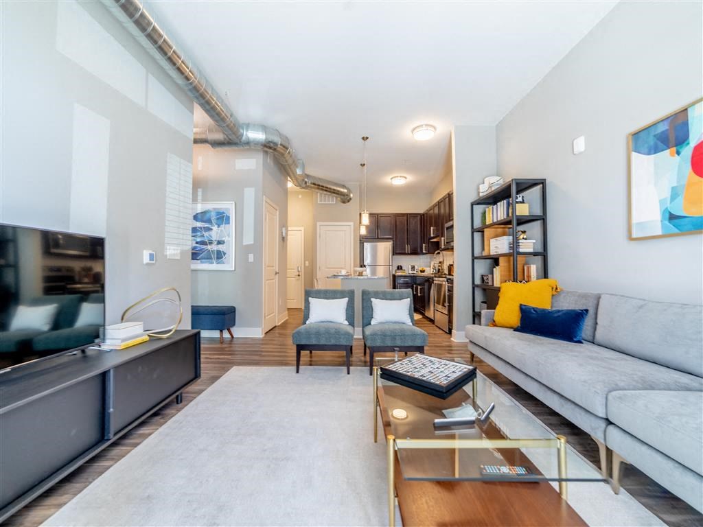 Living Room With Kitchen View at The Foundry, South Bend, IN