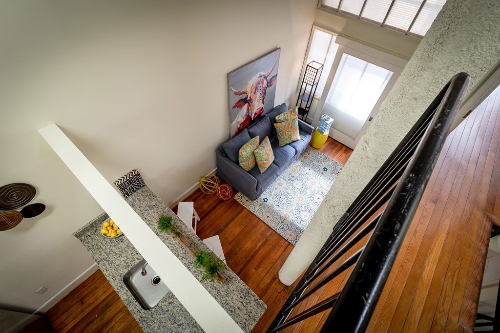 an overhead view of a living room with a couch
