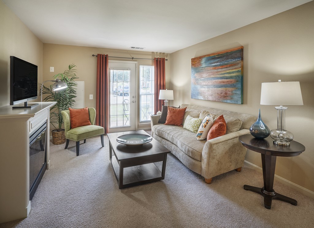 Warm Living And Dining Room at The Apartments at Wellington Trace, Maryland