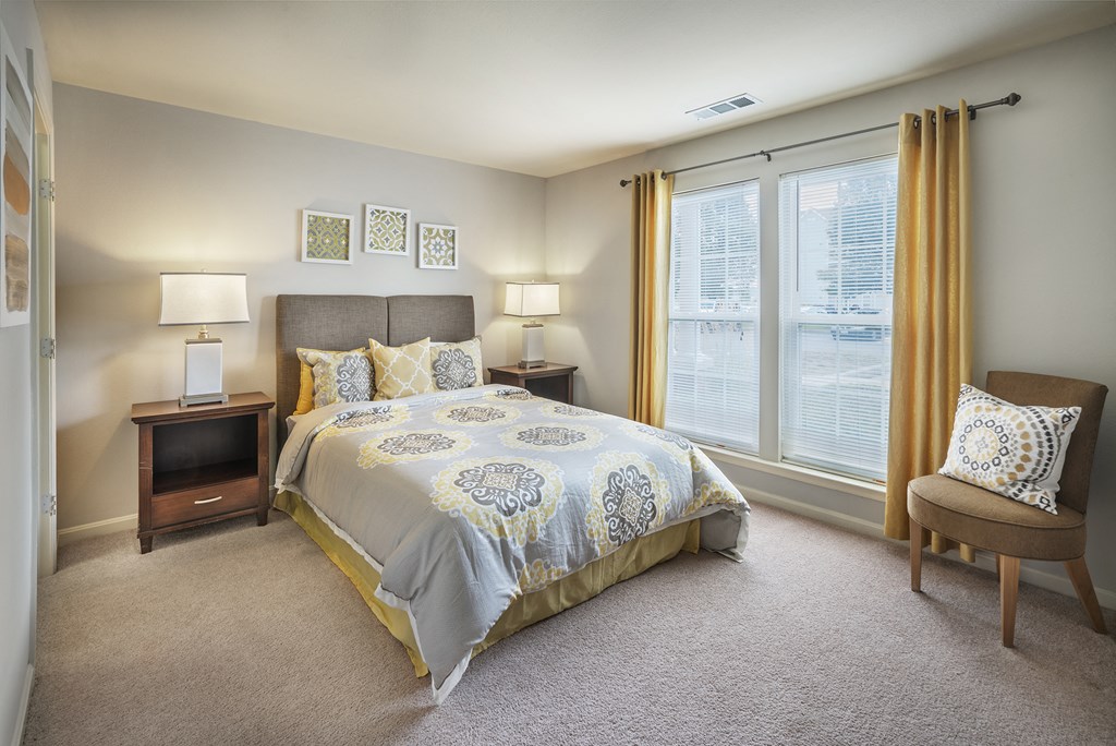 Comfortable Bedroom With Large Window Comfortable Bedroom With Large Window at The Apartments at Wellington Trace, Frederick