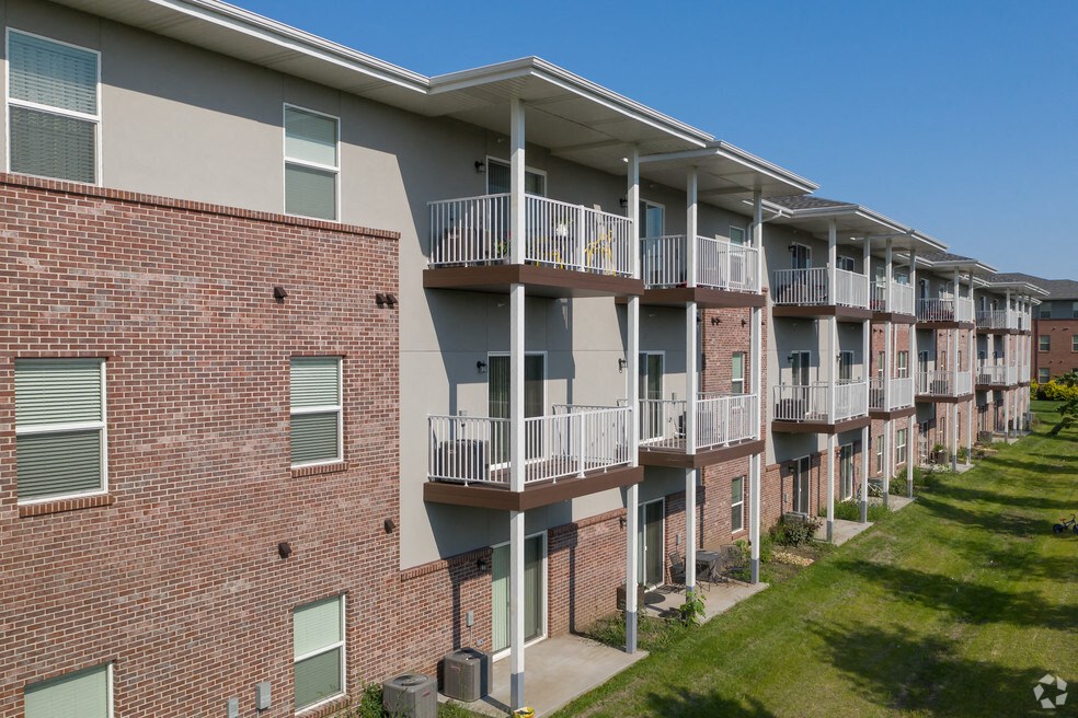 an exterior view of an apartment building with balconies