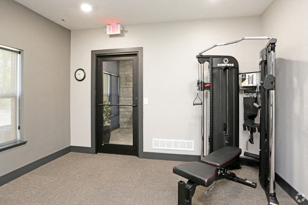 the gym at the flats at big tex apartments