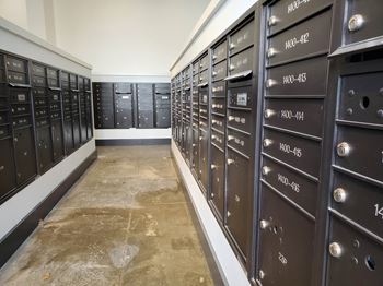 Mailboxes lined up in the mail room at 3800 Acqua Apartments in Suffolk, VA