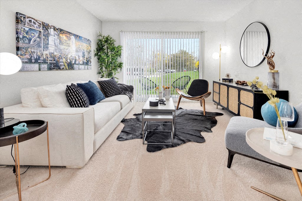 a living room with a couch and a table