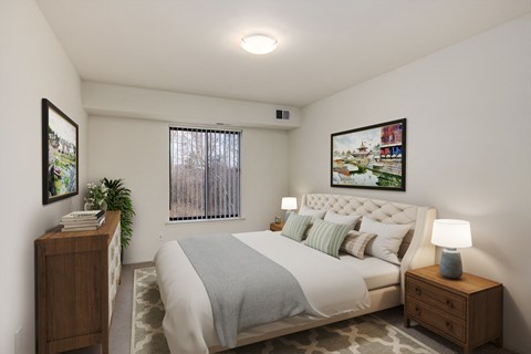 a bedroom with a bed and a dresser and a window