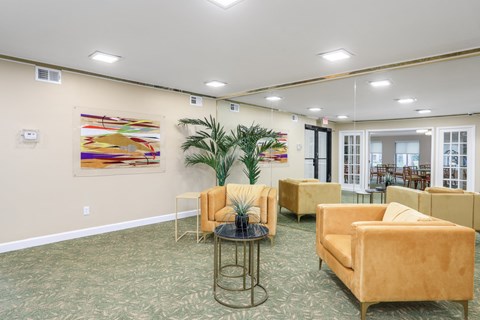 a living room with couches and a table