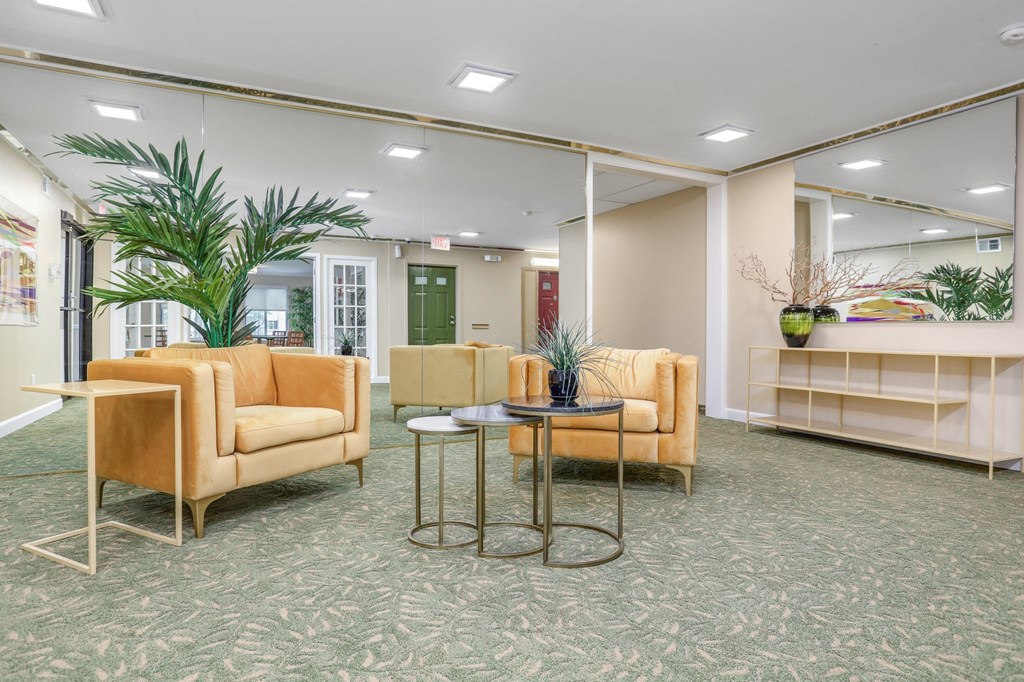 a lobby with couches and a table